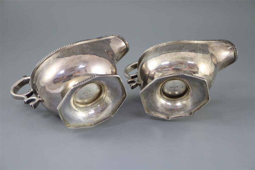 A pair of late Victorian silver pedestal sauceboats, by Roskell, Roskell & Hunt, 22oz.